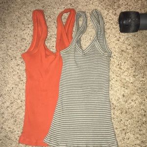 Burnt orange and green/ white striped tank tops